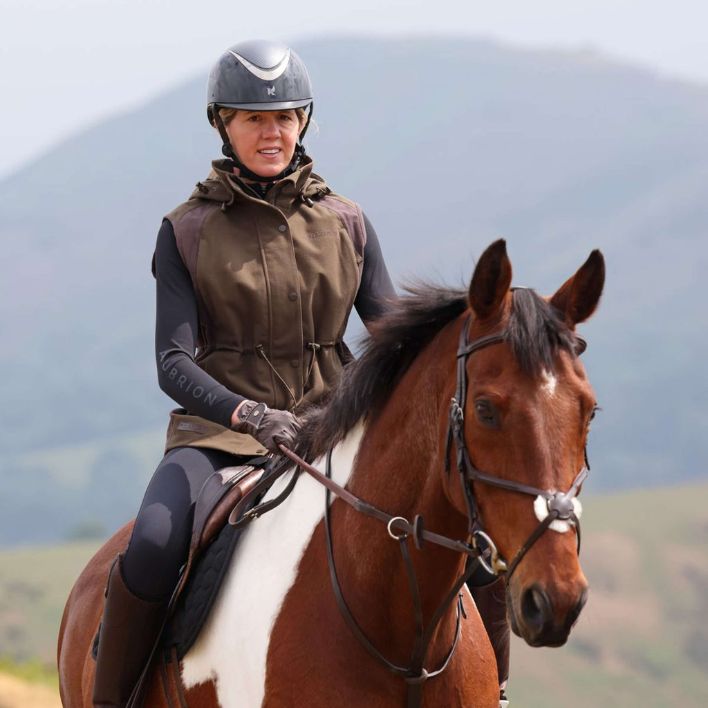 Aubrion by Shires Bodywarmer Heritage Donker Olijf